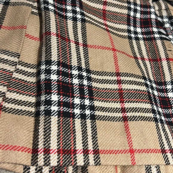 Toddler plaid skirt measures approximately 10 1/2 inches across the waist. - Picture 4 of 8